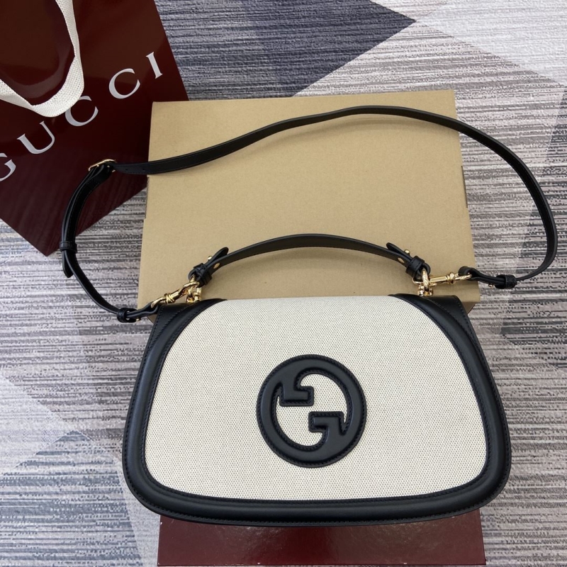 G*u*i top handle bags
